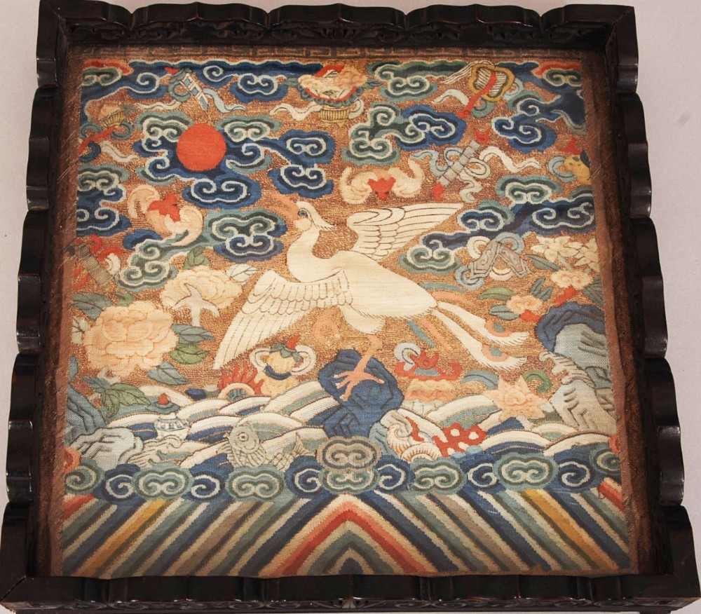 C19th Chinese silk Kesi rank badge, woven with a goose standing on rockwork surrounded by clouds,