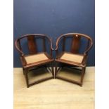 Pair of Chinese hardwood horseshoe backed chairs
