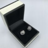 Pair of white gold south sea pearl earrings