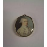 C18th yellow metal framed miniature of a gentleman