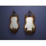 Pair of Victorian wall mirrors, with ornate carved & gilt frame flanked each side with candle