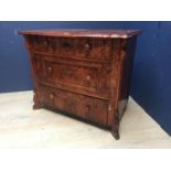 C19th hardood veneer small chest of 3 varying long drawers below a serpentine moulded top and canted