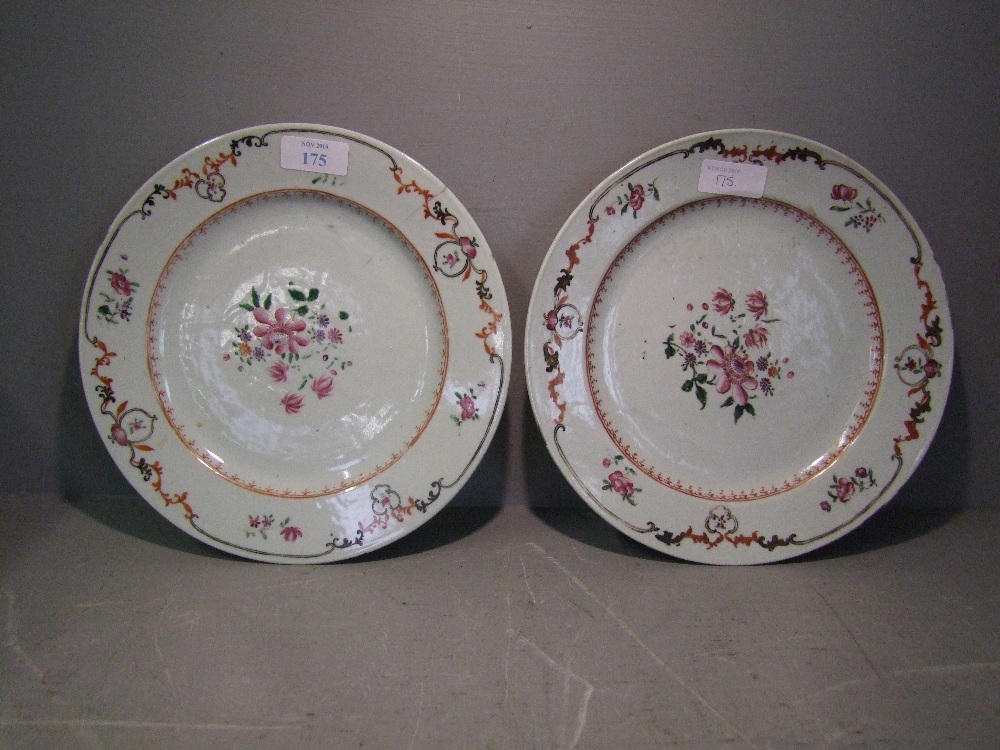 Pair of famille rose plates with floral decoration (rim chipped & cracked) 23cm D