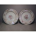 Pair of famille rose plates with floral decoration (rim chipped & cracked) 23cm D
