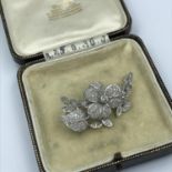 18ct white gold flower shaped diamond set brooch