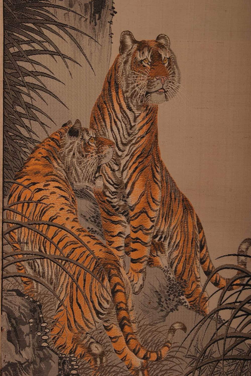 C20th Chinese embroidered hanging scroll, woven with two tigers, poetic inscription to the top right - Image 2 of 3