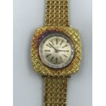 18ct Gold Jaeger Le Coultre ladies cocktail watch, square case with round face on integral, 18ct