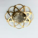 9ct Rose gold openwork brooch set in oval free cut smokey quartz 5.9g