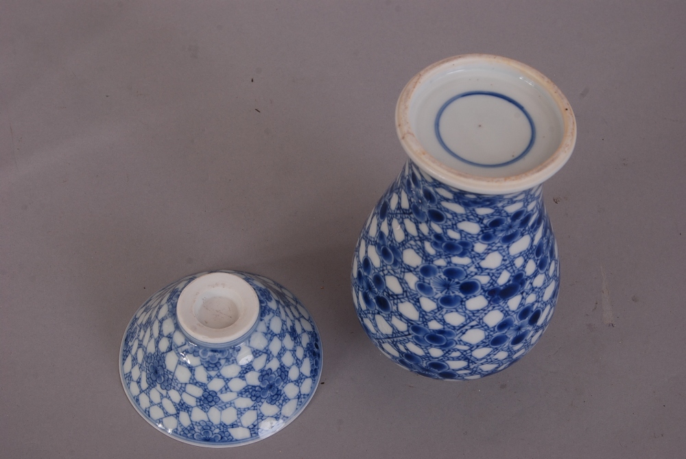 Chinese blue and white baluster vase, painted with prunus on a cracked-ice ground, Kangxi, 17cm - Image 4 of 4