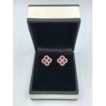 Pair of 18ct yellow gold ruby & diamond earrings of 1.4cts