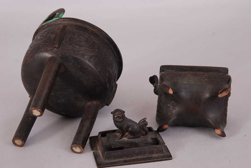 C19th Chinese bronze ritual tripod vessel, Ding, raised on three columnar supports and cast to the - Image 3 of 3