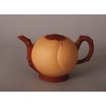 C19th Chinese Zisha teapot, modelled as a peach with knobbled handle and spout, 18.2cm wide