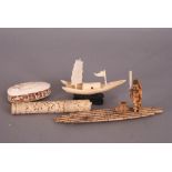 C19th Chinese carved ivory group, depicting a fisherman standing on a raft with his fishing
