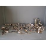 Large quantity of silver plated flatware together with a qty of other metal ware inc pepper mills,
