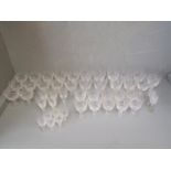Stuart cut crystal glasses, 11 claret glasses, 10 white wine glasses, 12 Champagne glasses, 5 port