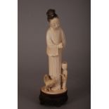 C18th/19th Chinese ivory figure group of a lady and a boy, 26.5cm high, wood stand