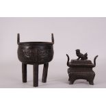 C19th Chinese bronze ritual tripod vessel, Ding, raised on three columnar supports and cast to the