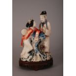 C19th Chinese stained ivory figure group of a court lady and an officer, 26.5cm high, silver-