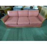 Large wooden framed sofa with red covering 210 x 89 x 67H