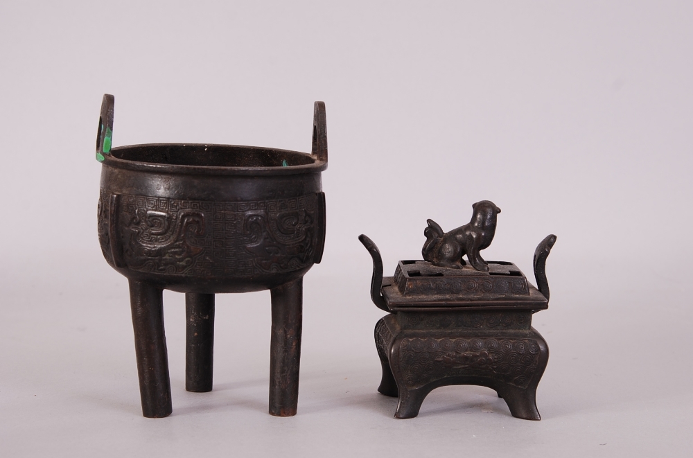 C19th Chinese bronze ritual tripod vessel, Ding, raised on three columnar supports and cast to the - Image 2 of 3
