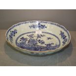 C18th Chinese oval blue & white lobed bowl decorated with flowers, fence & bird, old label verso