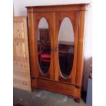 Mahogany and satin wood inlay 2 door wardrobe, inset doors with 2 oval mirrors, above base drawer,