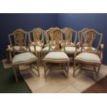 Set of 12 (10 + 2 carvers) contemporary dining chairs, in a light wood, blue painted inlay, with