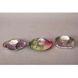 Three sets of C18th Chinese painted enamel cups and saucers, the first of peach form and painted