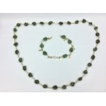 Yellow metal & Jade necklace & bracelet set