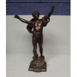 Bronze figure of a standing man, his arms outstretched titled to base Triomphe 68cm