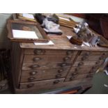 Map chest of 12 long drawers with brass cup handles, 75Hx140Wx95Dcm