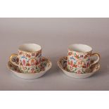 Pair of C19th Chinese famille rose cups and saucers, painted with four medallions enclosing