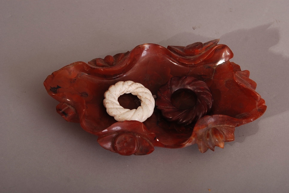 C19th Chinese carnelian agate brush washer, in the form of a large lotus leaf, carved in openwork