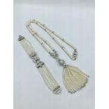 Pearl & diamond negligee necklace with diamond set clasp & drop marked 750 with an Art Deco style