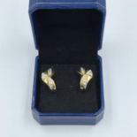 Pair of yellow gold & diamond earrings