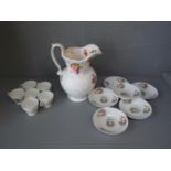 6 early Staffordshire floral cups & saucers (1 cup cracked) Early Staffordshire ewer (wired handle)