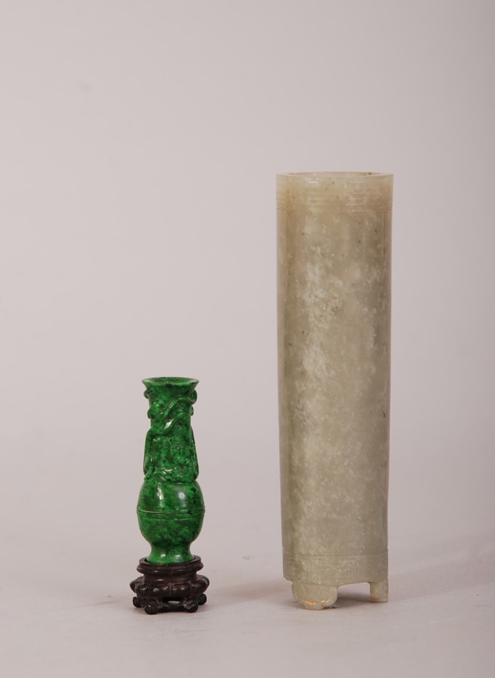 C18th/19th Chinese jade incense holder, raised on three ruyi-head supports and with two key-fret