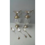 Pair silver plated and glass claret jugs & spoons