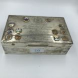 Cedar lined silver cigarette box decorated with badges of the Canadian provinces, 3 silver match box