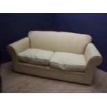 3 seater 1990s sofa with pale lime green fitted covers 190w x 95d cm