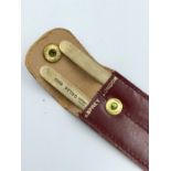 Pair of 9ct gold collar stiffeners in original leather case by Asprey & Co London