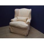 Large wing chair with loose cover