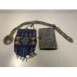 1920s bead bag & a 1950s diamante bag & a white metal & filigree ladies' belt, mounted on blue