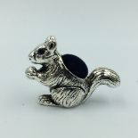 Silver pin cushion in the form of a squirrel