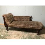 Fabric covered Chinese style chaise longue with a carved mahogany frame 60Wx169L cm