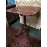 Good Regency mahogany pedestal swept tripod tilt top occasional table with shaped oblong top and a