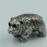 Silver figure of a bear