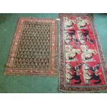 2 rugs: 1 with pink borders, brown & black centre 190x125cm; 1 with blue & black borders, dogs &