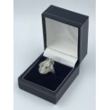 Ring Art Deco 18ct white gold, diamond, set with diamonds surround