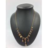 9ct Gold & garnet necklace set with spessortie, knodolite & Mali garnets 5.5g